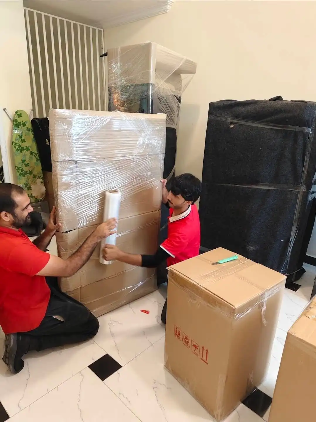 Cheapest Day for Moving in Abu Dhabi 1 Expert Movers team on an apartment move in an Al Reem Island tower, Abu Dhabi